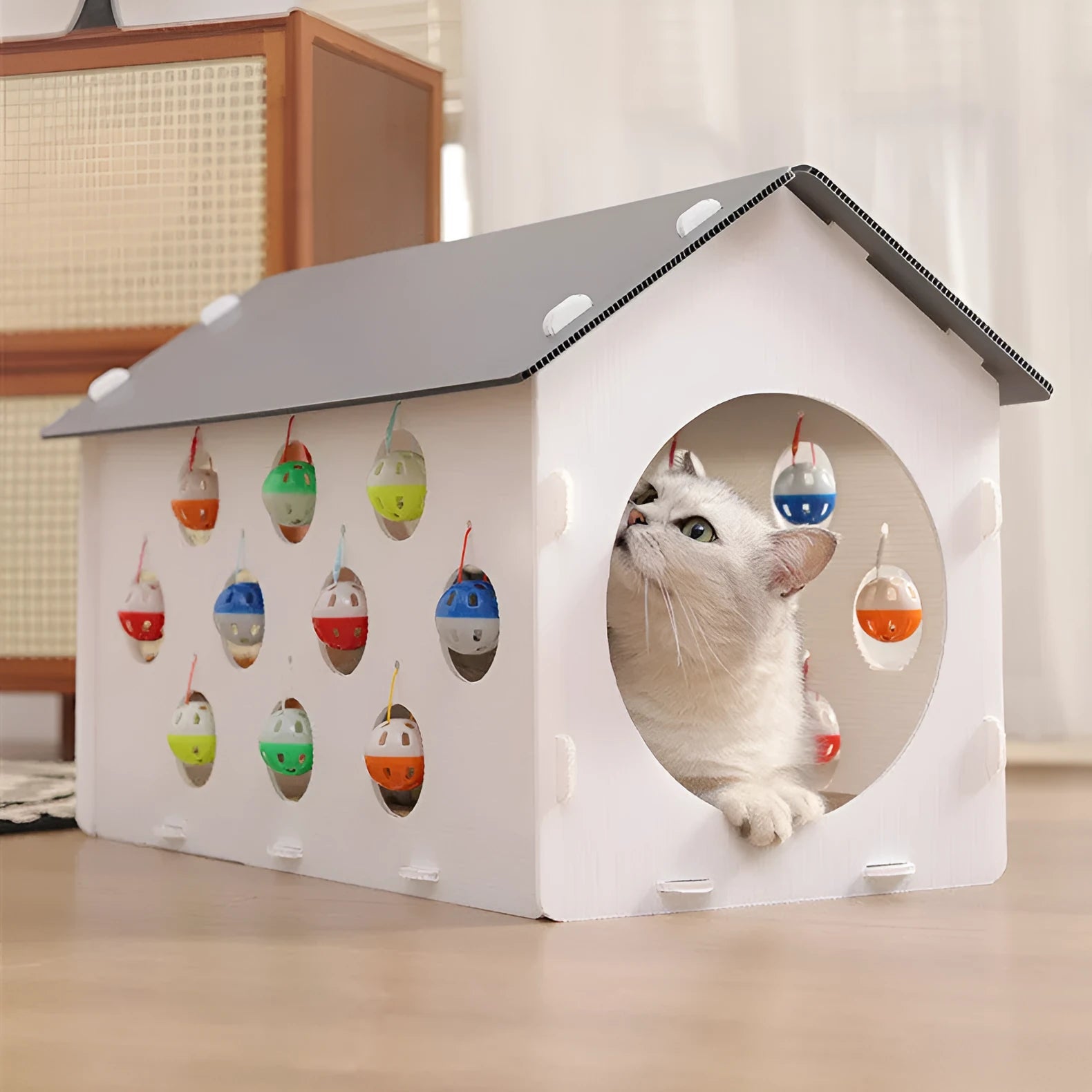 Plastic house cat scratch board with integrated bell ball and tunnel for feline scratching and play