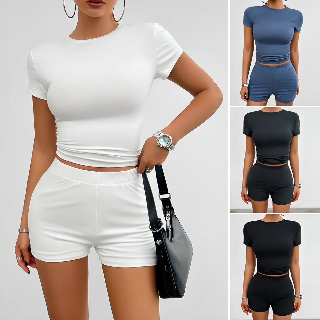 Women's slim fit solid colour viscose sportswear set with short sleeve T-shirt and elastic shorts.