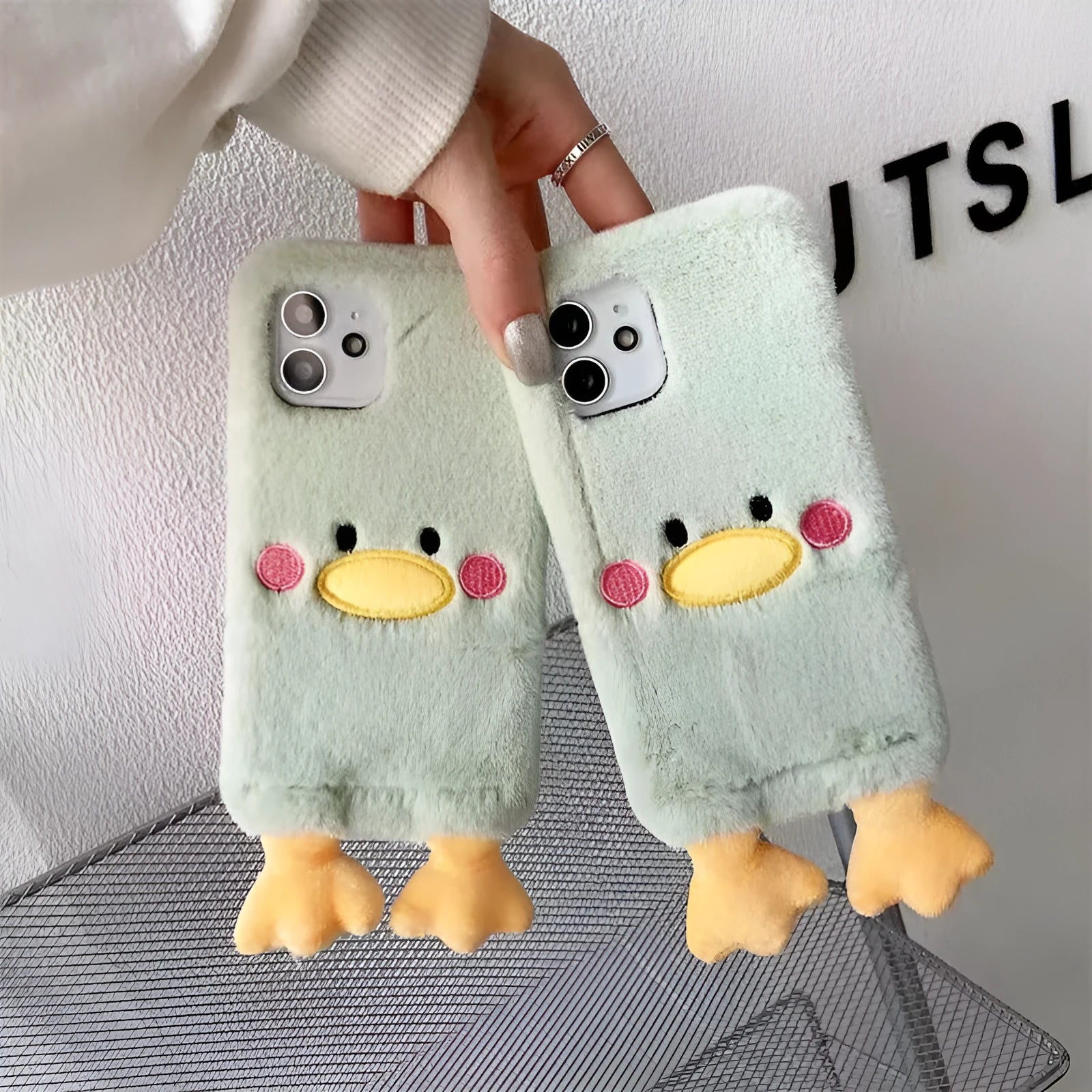 Plush TPU phone case for iPhone 15 Pro with cute duck design in plush vertical duck colour