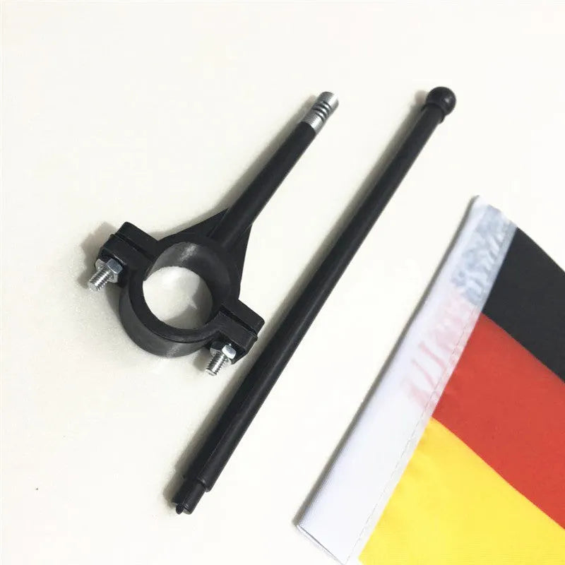 Cycling handlebar flag pole with small square polyester flag attached to plastic pole