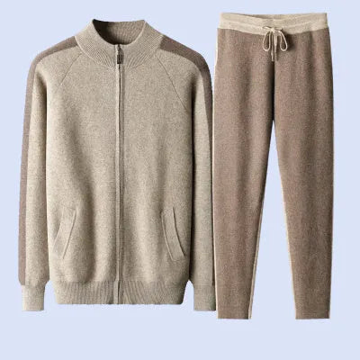 Man wearing a camel-coloured cashmere blend half turtleneck zip cardigan and matching trousers.