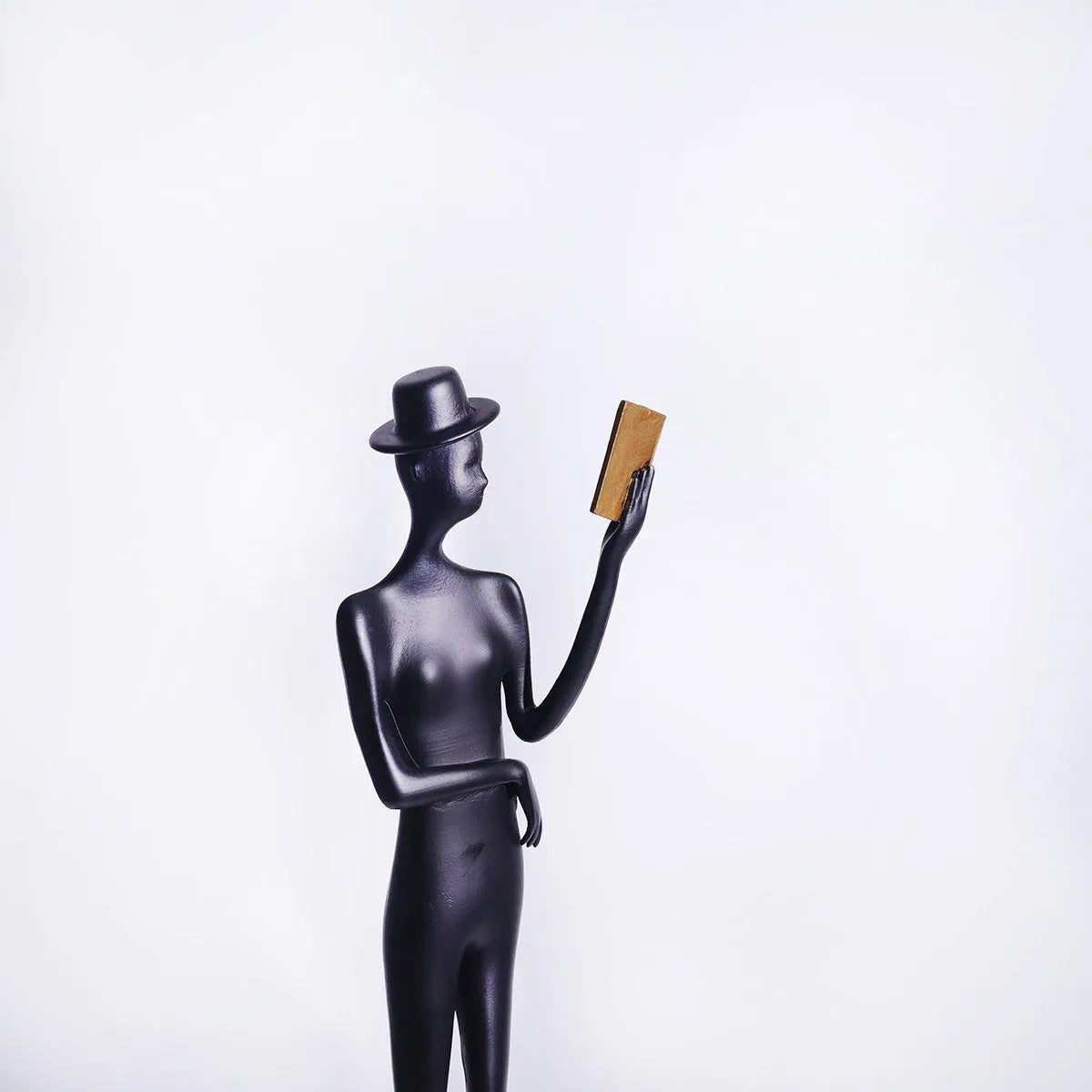 Black aluminium reading woman desktop sculpture modern decor 12x51cm