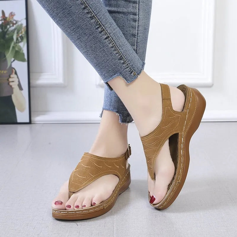 Women's casual wedge heel sandals with adjustable buckle strap in solid red colour