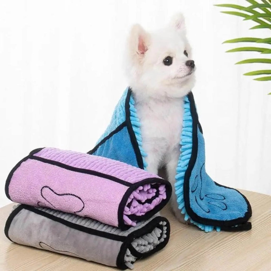 Blue pet bath robe towel for drying dogs and cats, shown with dimensions 62cm by 23cm.