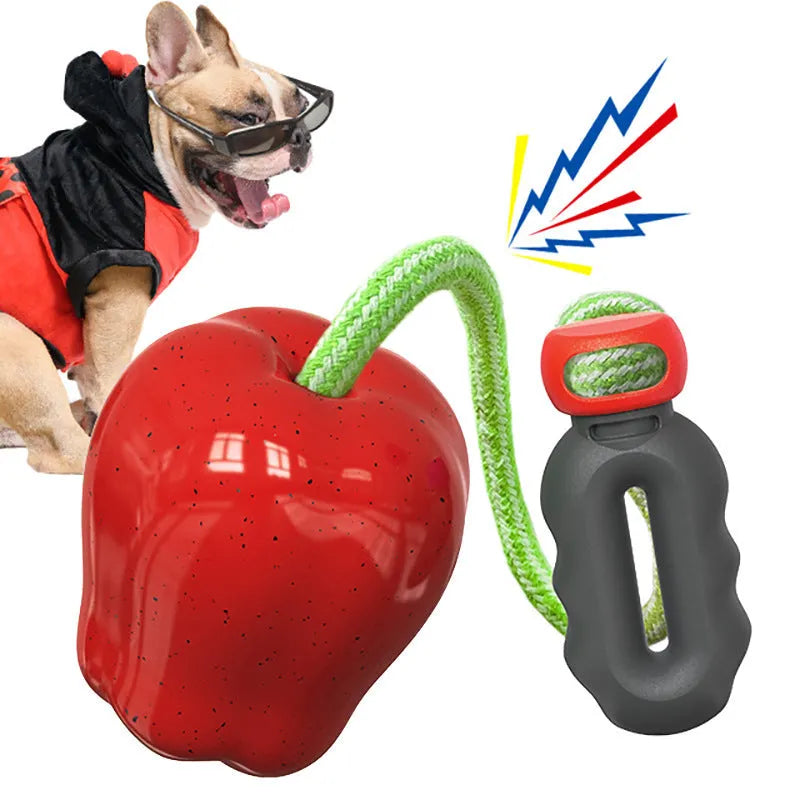 Green plastic dog toy with textured surface and hollow centre for treat insertion