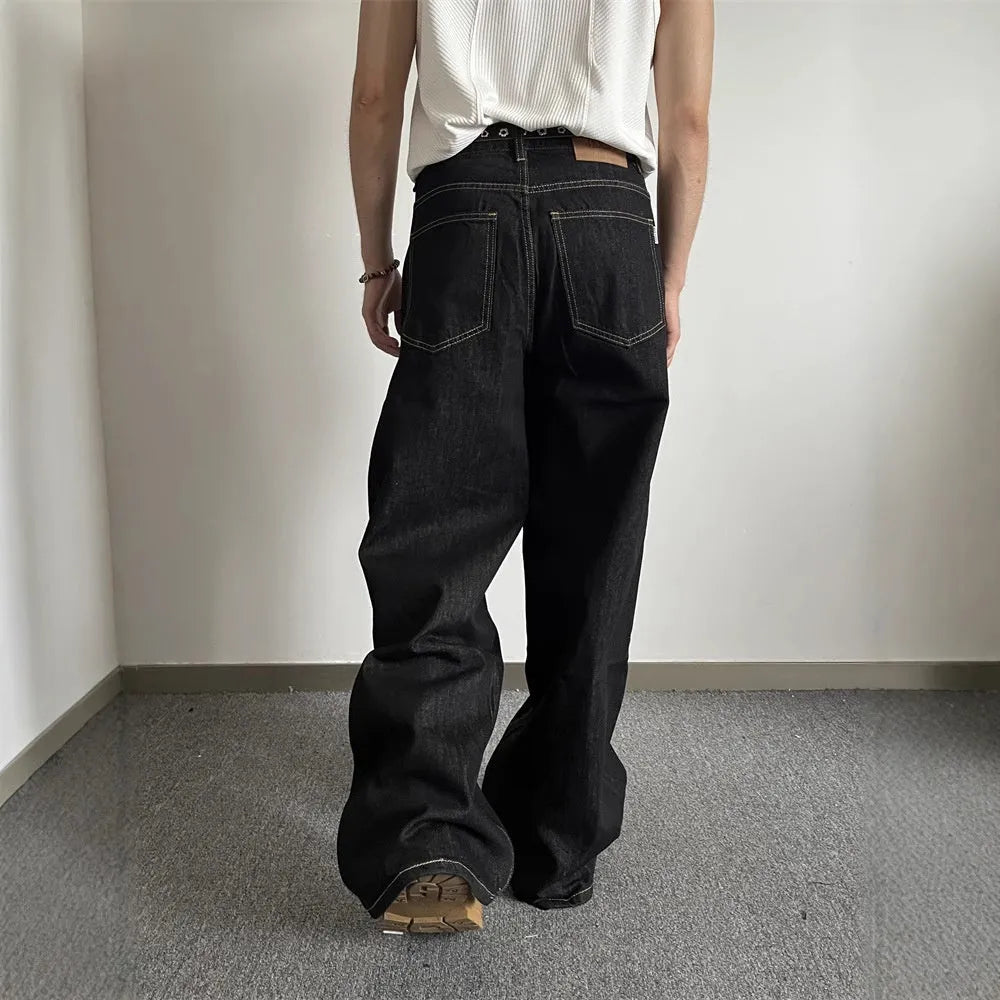 Black retro wide-leg jeans with straight-leg design and zip placket closure
