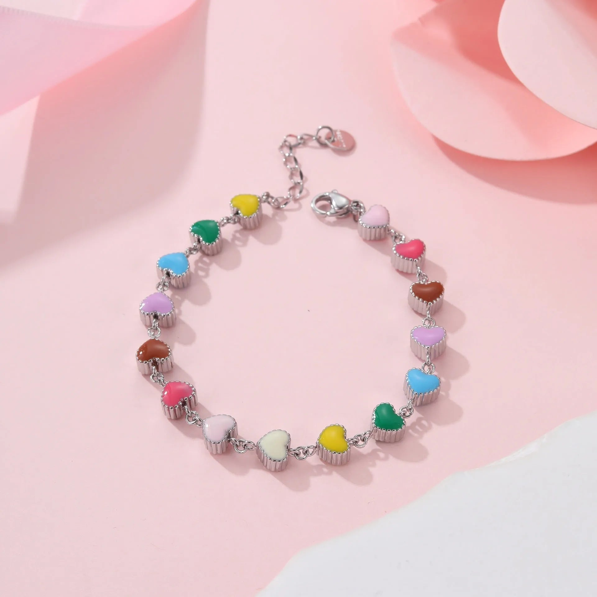Gold or steel tone stainless steel love heart pendant bracelet for women.