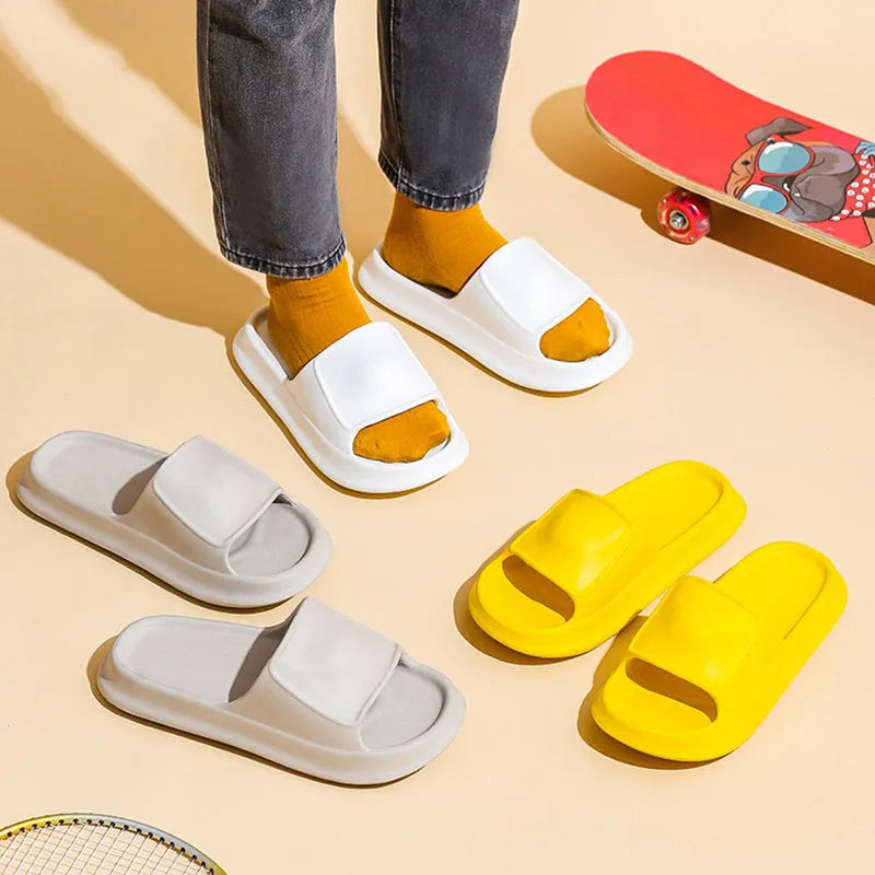Thick-soled EVA flip-flop slippers in multiple colours on a white background.