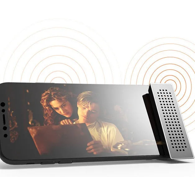 Portable black ABS plastic mobile phone amplifier bracket holding an iPhone in horizontal position.