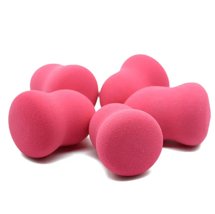 Pink hydrophilic non-latex makeup sponge for foundation application, shown at 4x4x5.6 cm size.