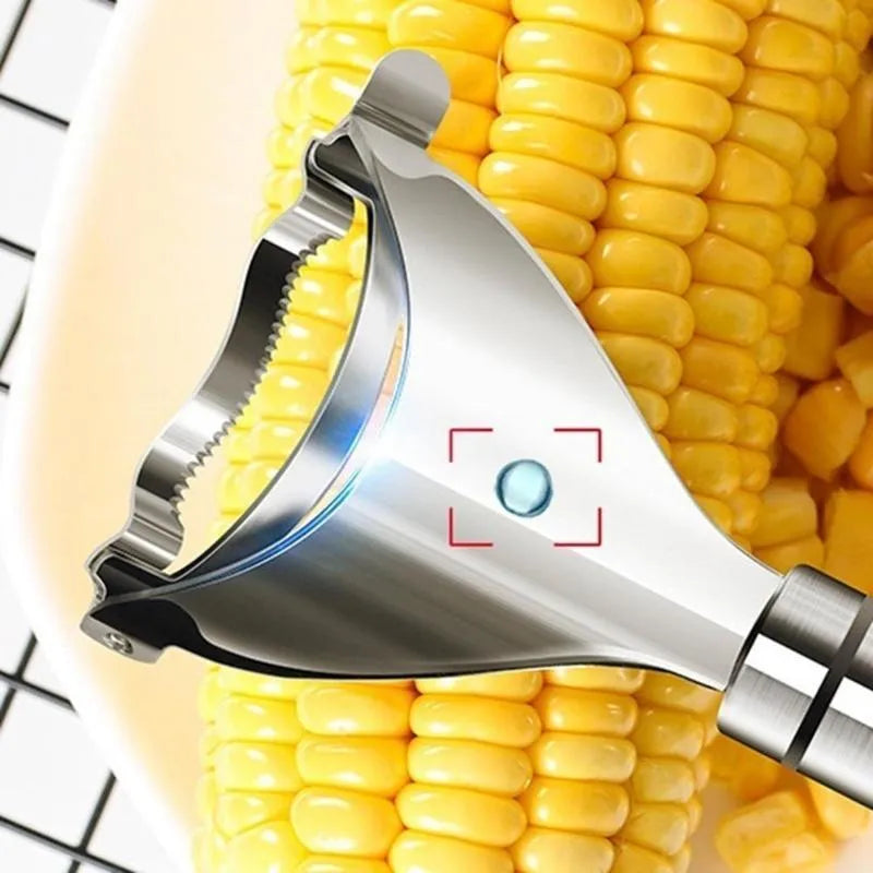 Stainless steel corn planer with silver finish on a kitchen surface measuring 18cm long