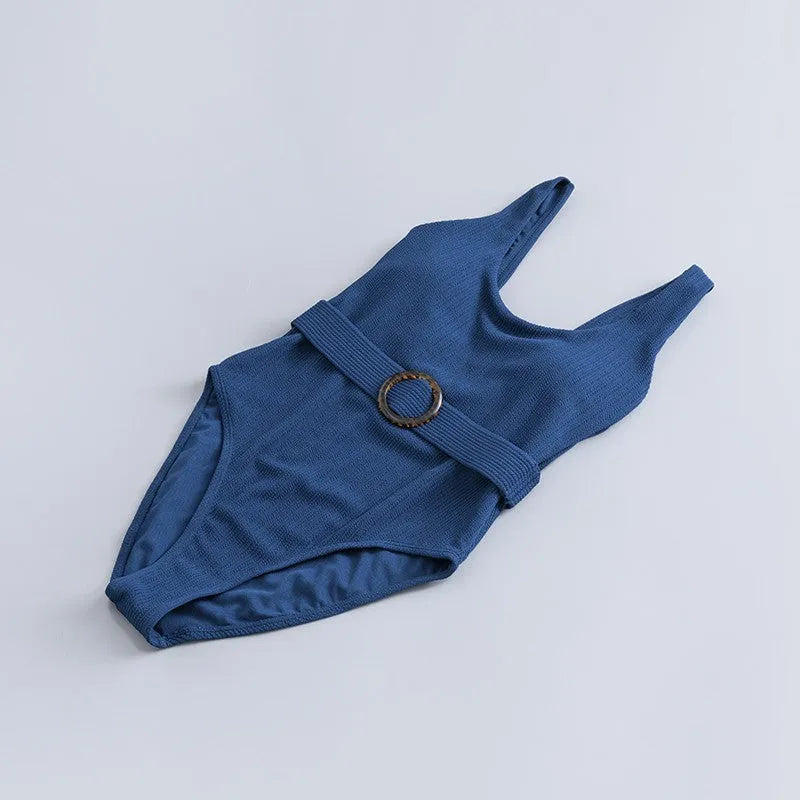 Navy blue women's one-piece slimming swimsuit with removable chest pads