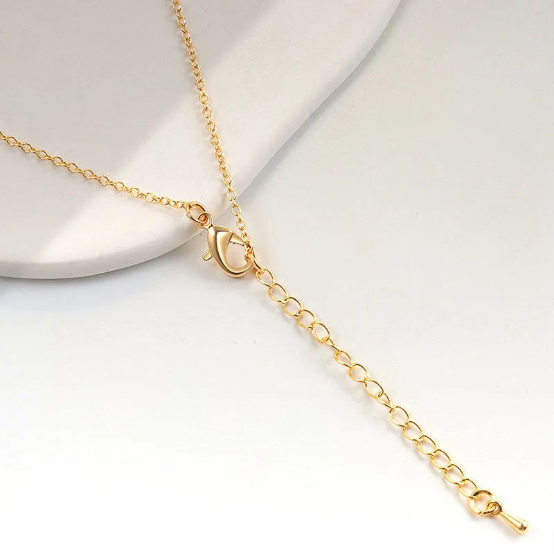 Women's gold electroplated copper zodiac constellation pendant necklace on O-ring chain
