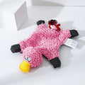 Mop plush duck dog toy in green on neutral background