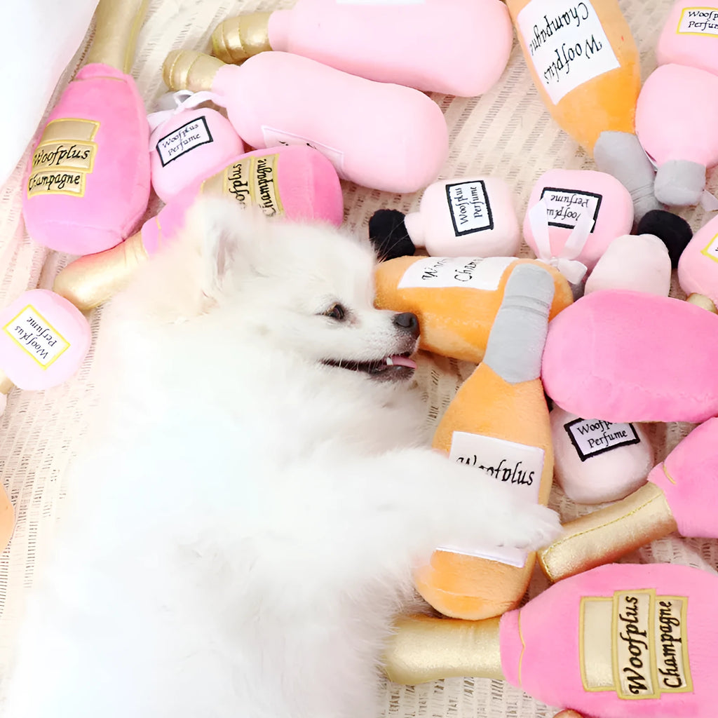 Plush wine bottle pet toy for dogs and cats with squeaker and crinkle sounds in six colour options