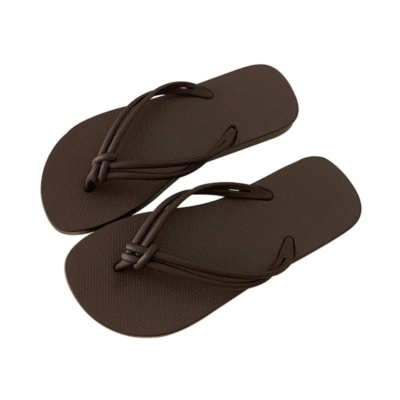 Men's PVC flip flops in a toe-covering style with a non-slip sole, shown in one of the available colours