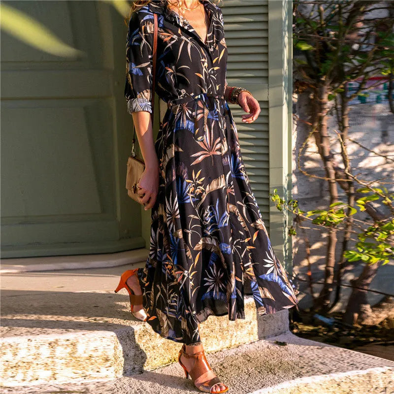 Vintage chiffon dress with V-neck and high-waisted A-line skirt in light blue.