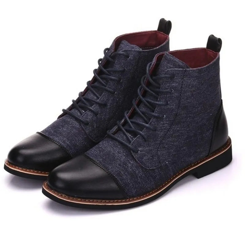 Men's black leather motorcycle boots with silver belt buckle detailing on rugged rubber soles