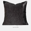 Modern grey and white plaid bed runner blanket set with a pillowcase and leather round pillow on a 1.5m bed.