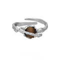 Women's silver Saturn design open ring with adjustable opening in white gold colour