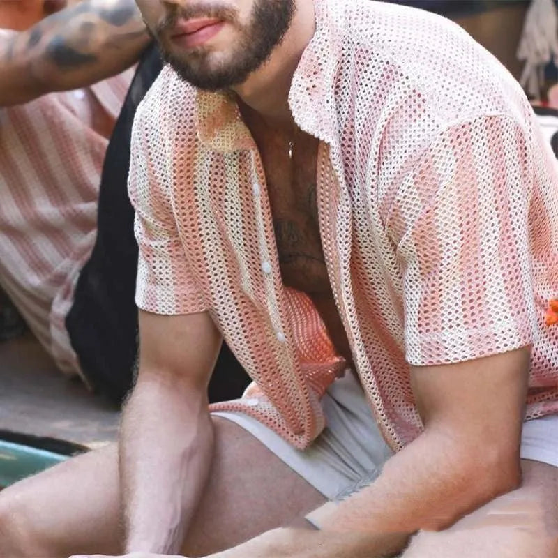 Pink men's short-sleeve cardigan shirt with a waffle-knit texture on a hanger.