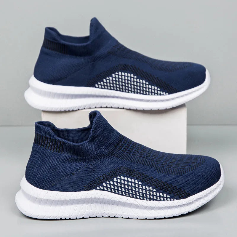 Flyknit fabric casual sneaker in solid colour with low-top and round toe.
