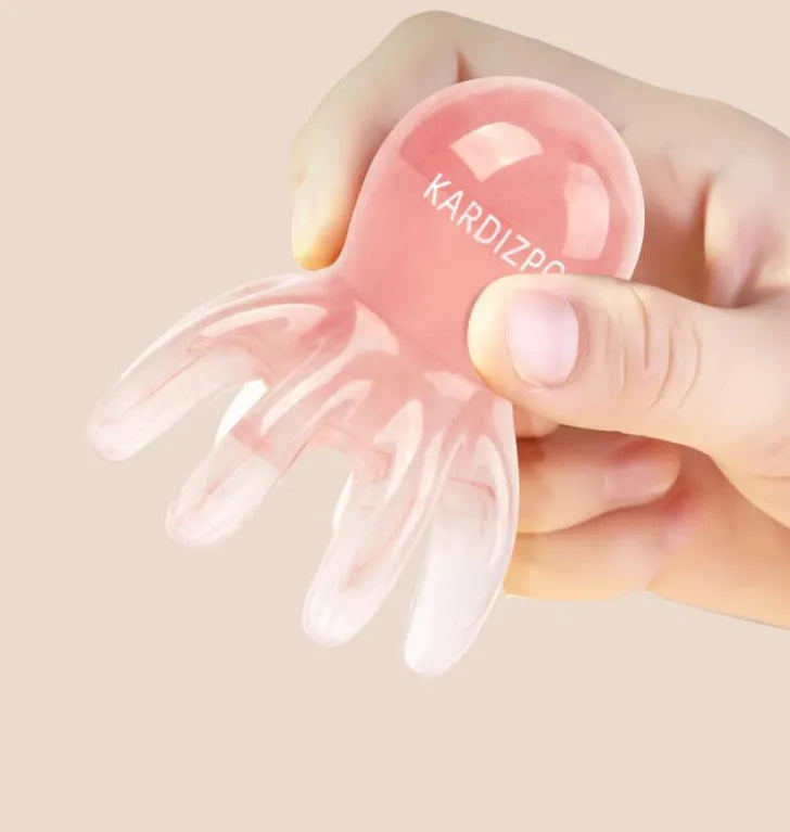 Pink natural resin octopus-shaped massage comb for periocular meridian health massage.