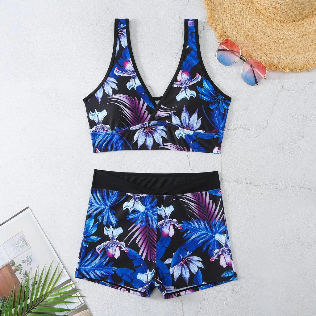 Women's two-piece swimsuit set with boxer brief bottoms in a printed design.