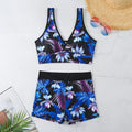 Women's two-piece swimsuit set with boxer brief bottoms in a printed design.