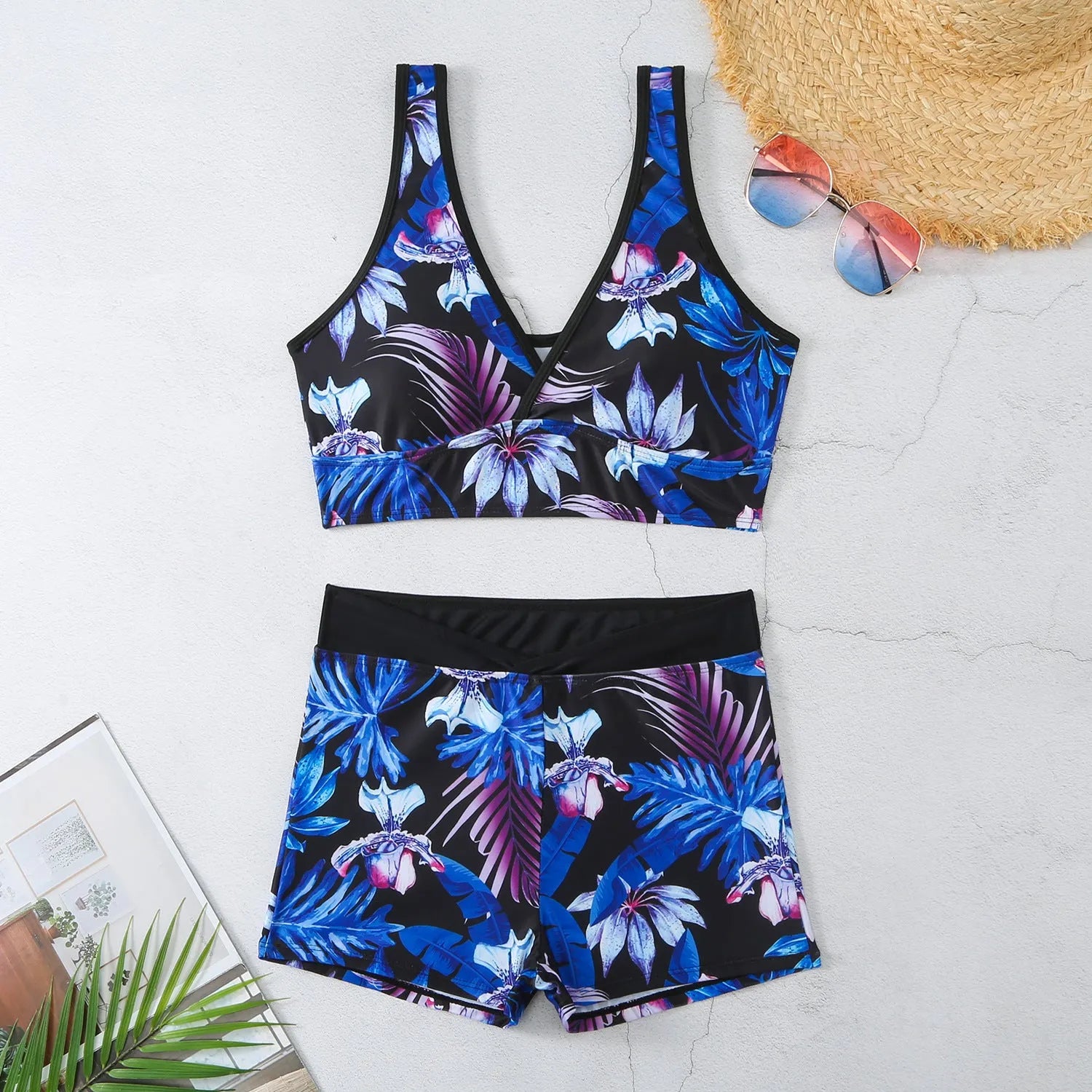 Women's two-piece swimsuit set with boxer brief bottoms in a printed design.