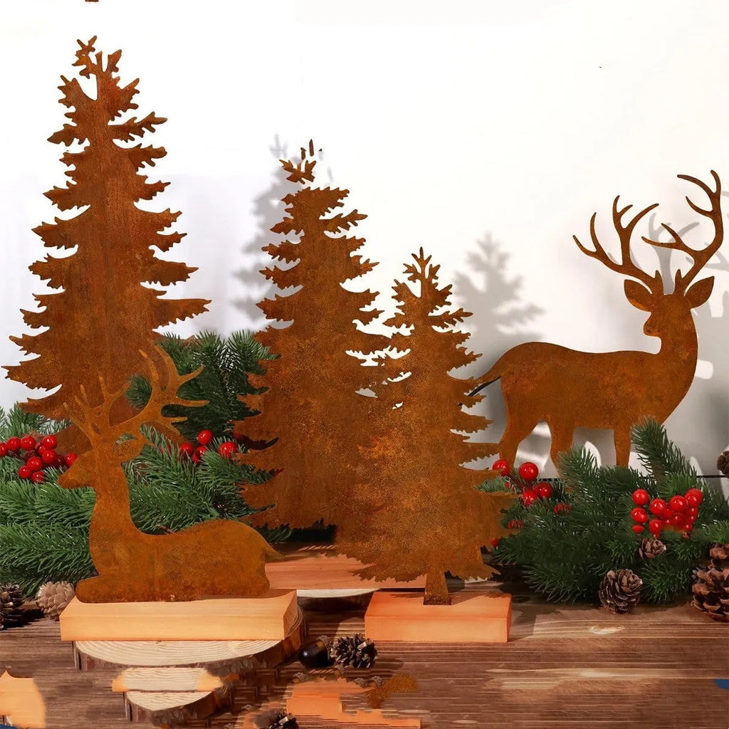 Three metal Christmas tree ornaments with elk silhouettes and rustic rust-effect finish
