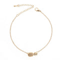 Women's alloy pineapple bracelet from XINGX series in gold or silver colour on wrist.