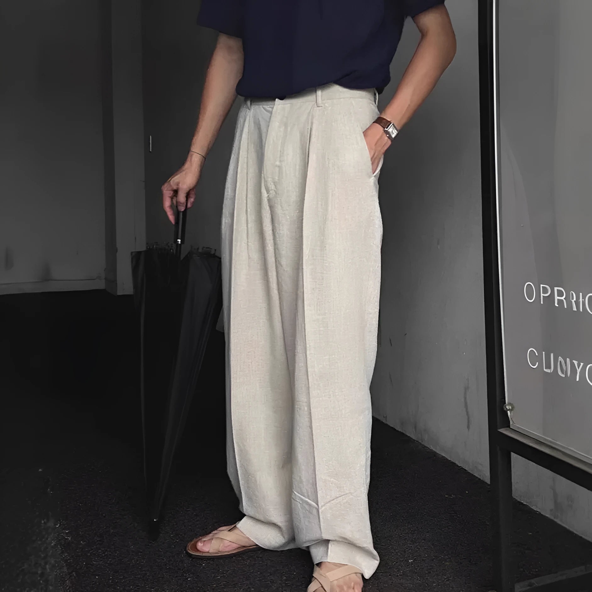 Men's apricot-coloured loose-fit cotton linen trousers with a wide-leg cut and elastic waistband