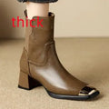 Brown women's high-heel Martin boots with a side zipper and cowhide leather upper.