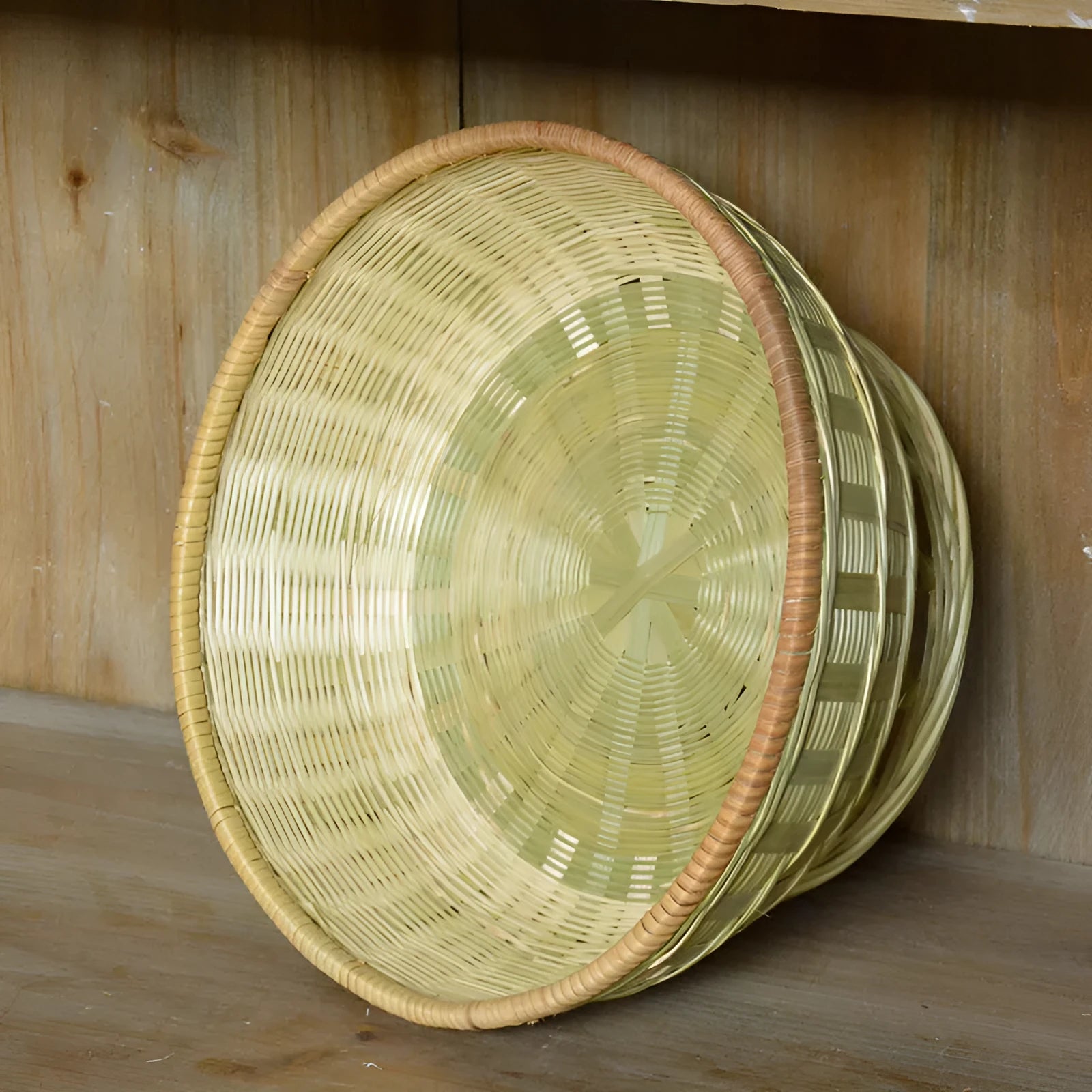 Handmade woven bamboo storage basket in one of three sizes for household organisation.
