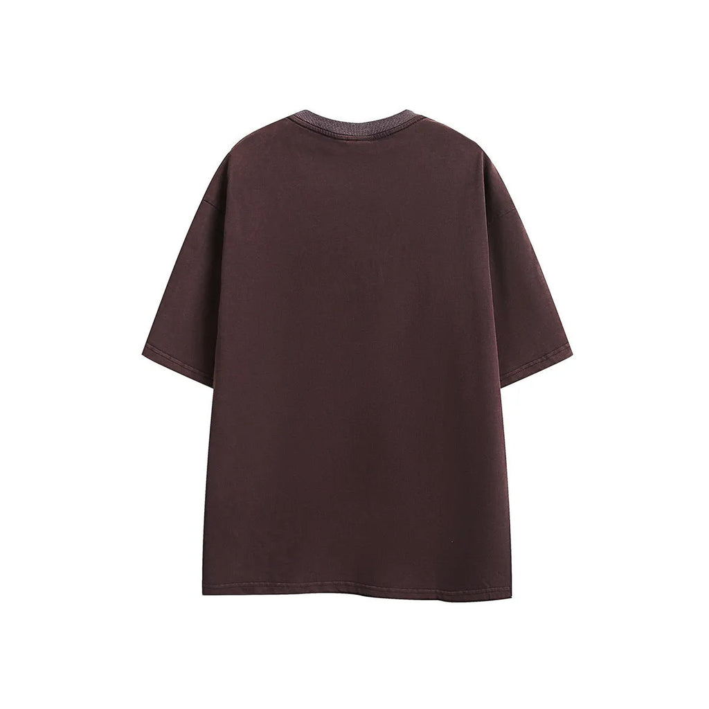 Purple loose-fit short-sleeved T-shirt with retro embroidery on the chest.