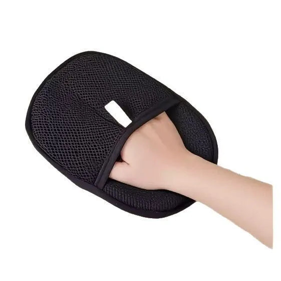 Black pet hair remover glove with dual-sided silicone bristles for grooming dogs and cats.