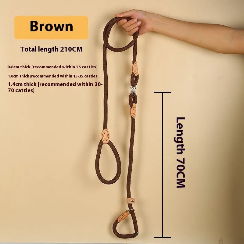 Brown nylon P-chain dog leash held in a hand, showing its full length and textured rope design.