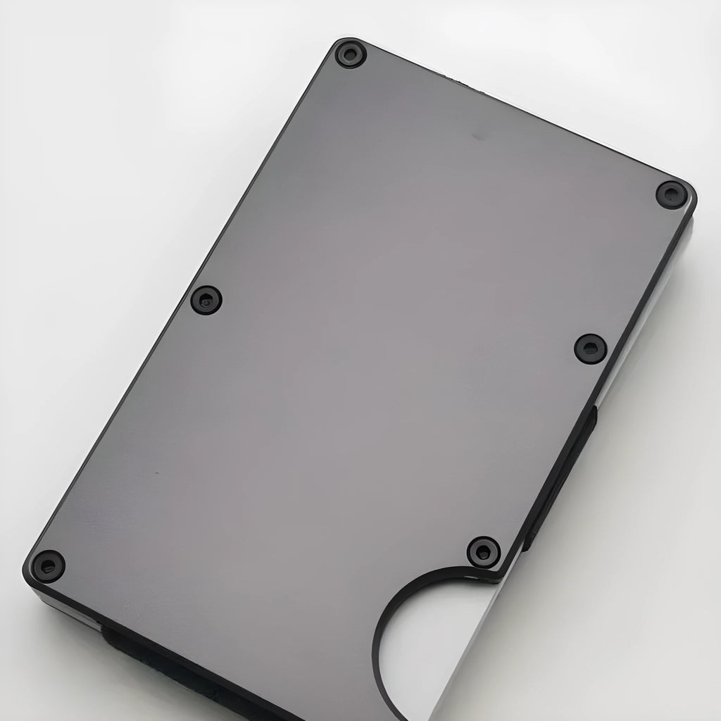 Carbon fibre credit card wallet with aluminium alloy grey finish showing anti-theft RFID protection features