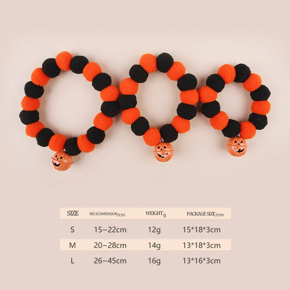 Halloween pumpkin-themed cat collar with Trick or Treat text and adjustable buckle.