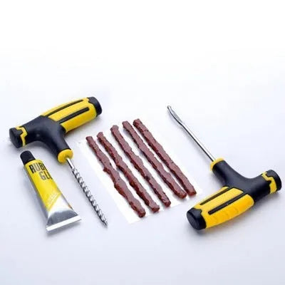 8 piece vacuum tyre repair tool set in plastic case with probe, pin, glue, and rubber strips.