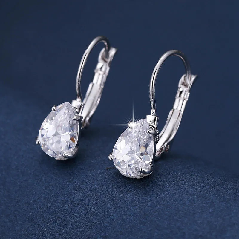Copper drop-shaped fashion earrings with platinum plating and inlaid gem details.