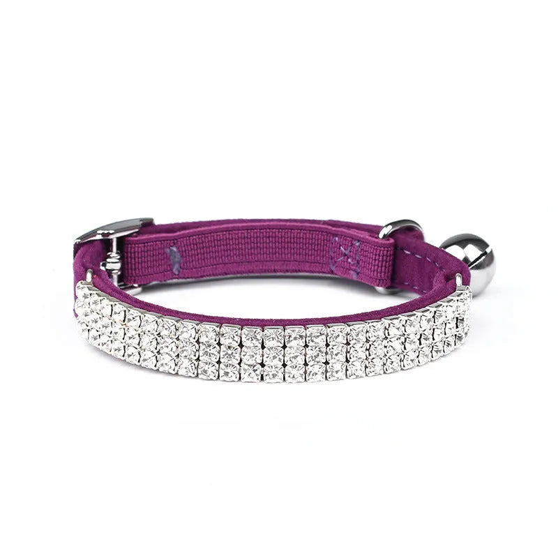 Red velvet cat collar with rhinestone decoration on an adjustable 20-30 cm strap.