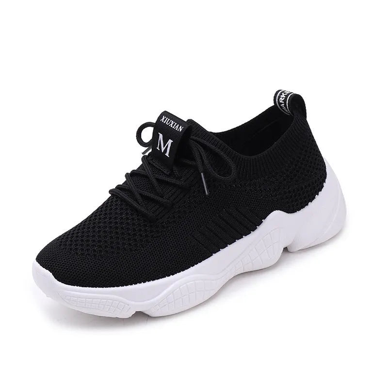 Women's white thick-soled casual sports shoes with woven upper and front strap closure.