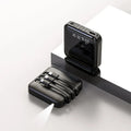 Black mirror-finish power bank with built-in three-in-one charging cable, showing 10000mAh capacity.