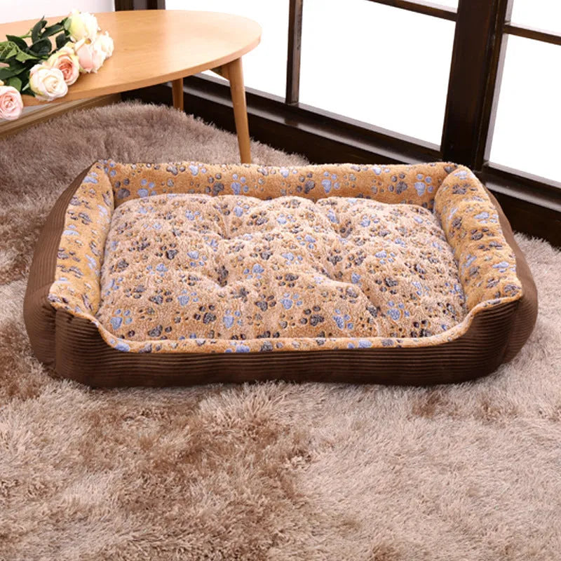 Beige plush bolster dog bed for small dogs on a wooden floor, showing non-slip bottom and raised sides.