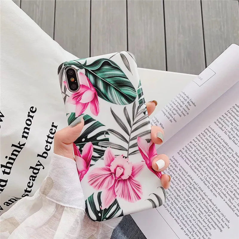 Pink floral pattern TPU iPhone case showing flower design on back cover for multiple iPhone models