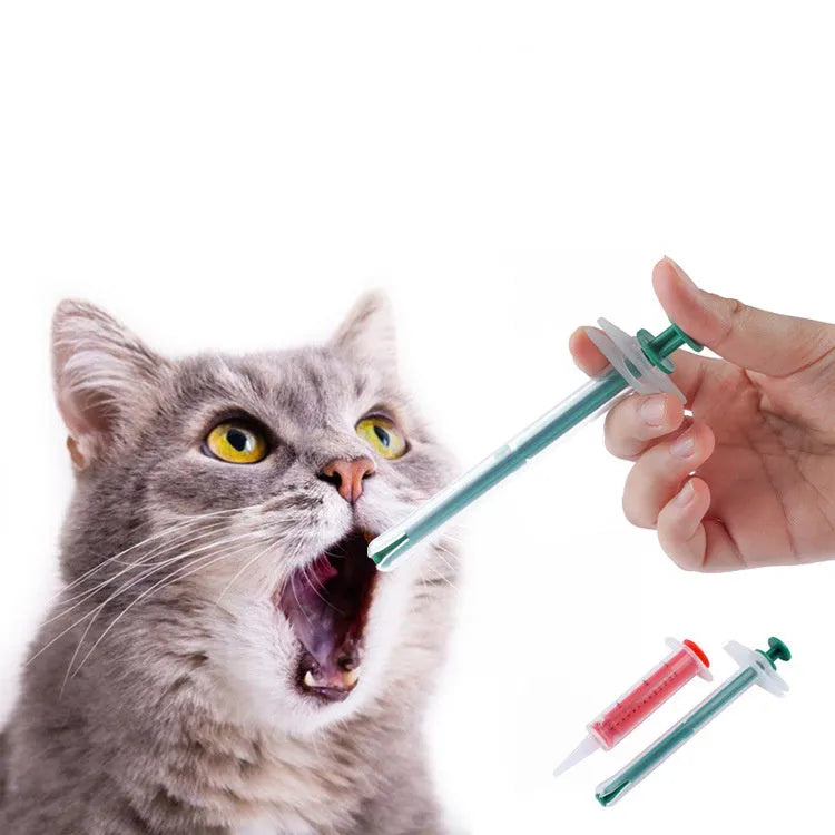 Two pet pill shooters with soft silicone tips for cat and dog medication feeding