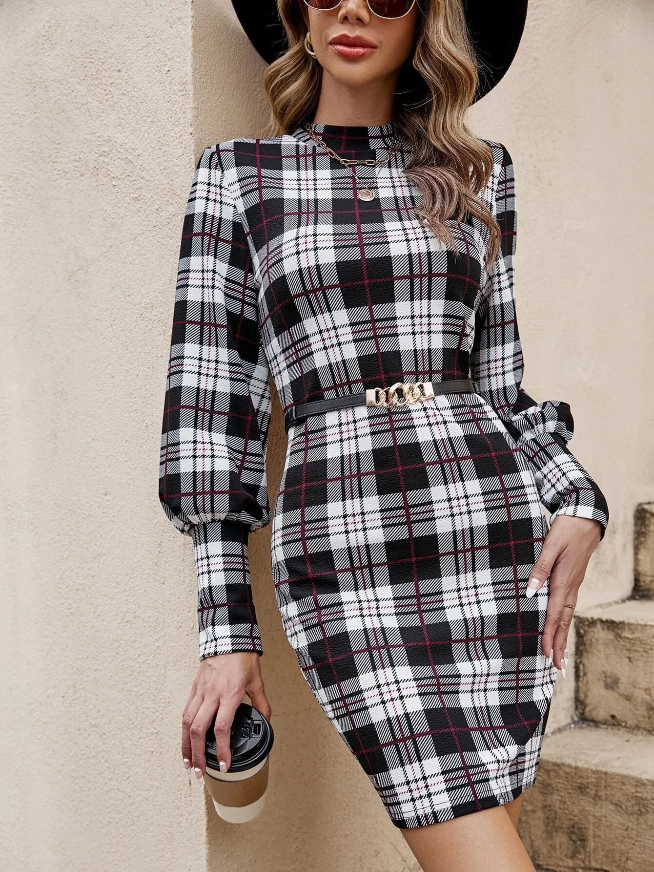 Black lantern sleeve tight dress with leather stitching detail on polyester fabric
