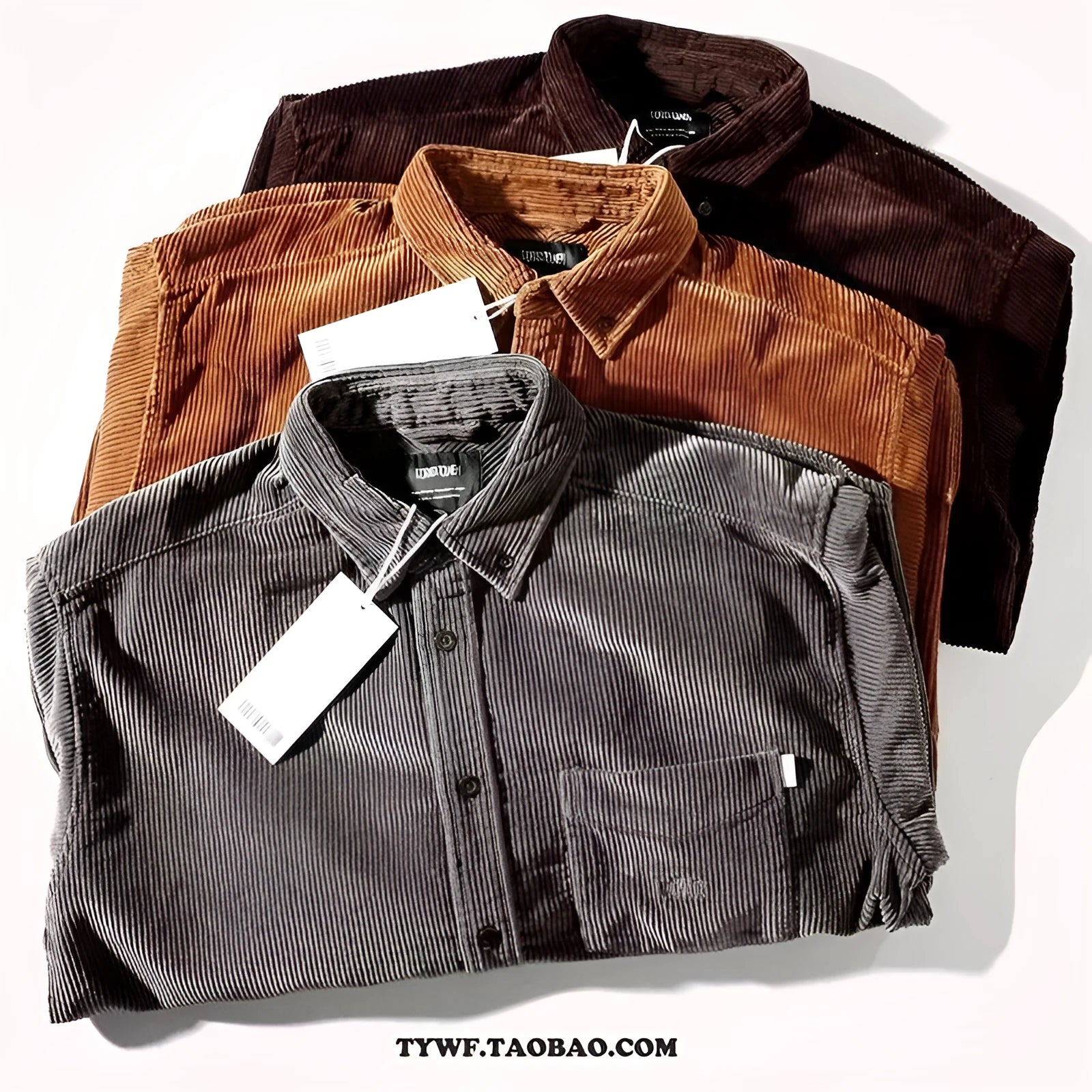 Caramel loose fit corduroy long sleeve shirt with cardigan style on a hanger.